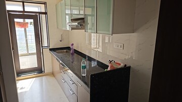 Kitchen in 3.5 BHK Apartment at Kalpa Taru Siddhachal VI, Kasarvadavali – for Rent