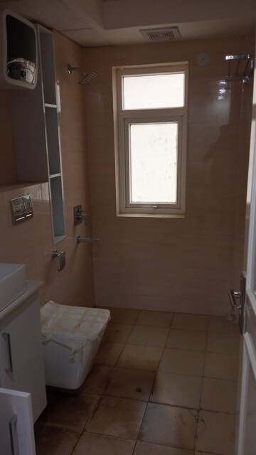 Bathroom in 2.5 BHK Apartment at Unnati Fortune The Aranya, Sector 119 – for Rent