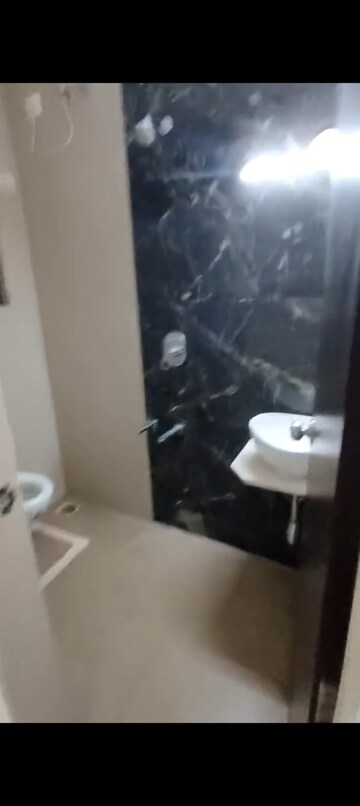 Bathroom in 1 BHK Apartment at Arihant Poonam Garden, Mira Road – for Sale