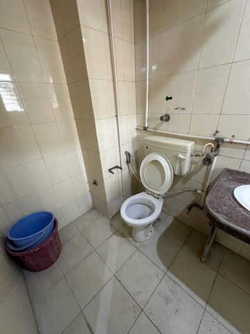Bathroom in 1 RK Apartment at Royal Palms Garden View, Goregaon East – for Rent