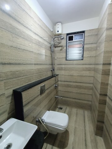 Bathroom in 3 BHK Apartment at Gala Pride Palms, Kolshet Road – for Rent