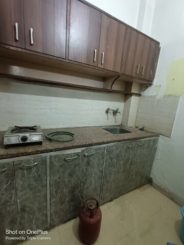 Kitchen in 1.5 BHK Builder Floor at Ansal Sushant Lok I, Sector 43 – for Rent