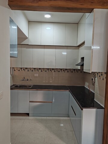 Kitchen in 2 BHK Apartment at Signature Orchard Avenue 2, Sector 93 – for Rent