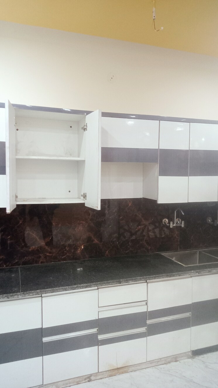 Kitchen, burari 3 Bedroom 99 Acre Apartment In Burari Delhi 8083476