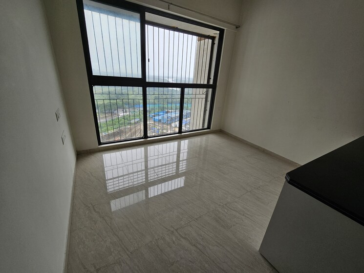 Living Room, lodha-quality-home-tower-2 1 Bedroom 317 Sq.Ft. Apartment In Saket Complex Thane 8083574