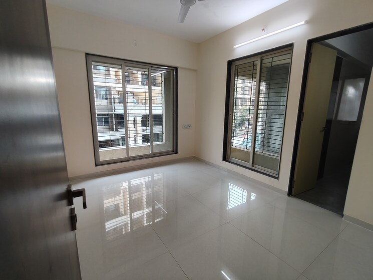 Bedroom, mohan-suburbia-phase-4 3 Bedroom 1022 Sq.Ft. Apartment In Ambernath Thane 8083712