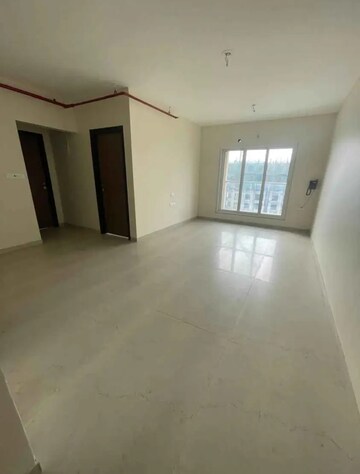 Living Room in 2 BHK Apartment at Dosti West County, Balkum Pada – for Rent