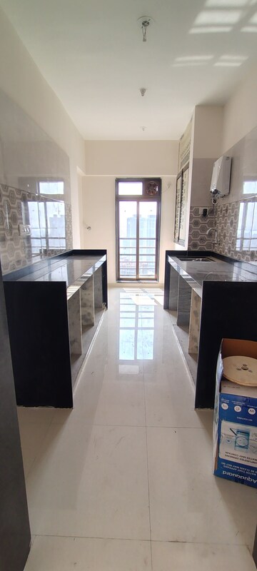 Kitchen in 2 BHK Apartment at Sanghvi Eco City Phase 3, Mira Road East – for Rent