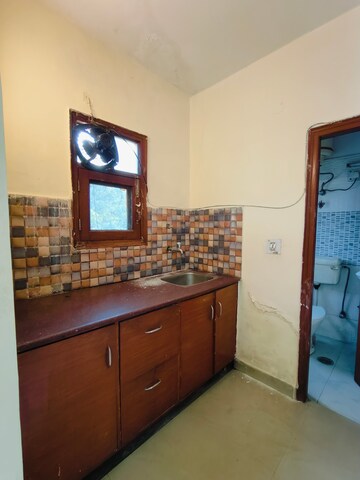 Kitchen in 1 RK Builder Floor at Ansal Sushant Lok I, Sector 43 – for Rent