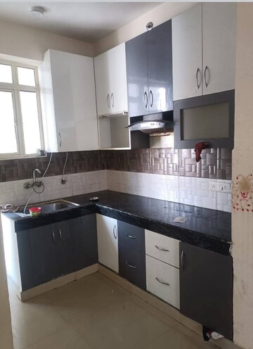 Kitchen in 3 BHK Apartment at Radicon Vedantam, Sector 16c Greater Noida – for Rent