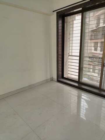 Bedroom in 2 BHK Apartment at Aristo Usha Heights, Kharghar – for Rent