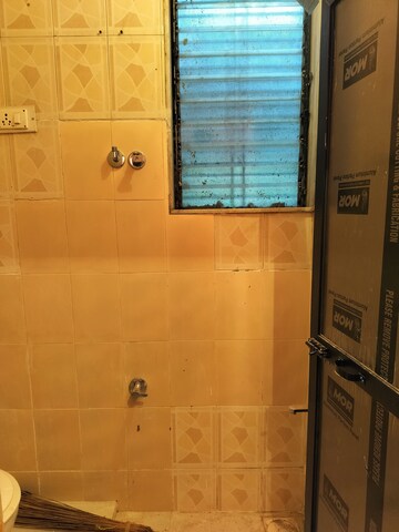 Bathroom in 1.5 BHK Apartment at The One Plaza CHS, Sector 19a – for Rent