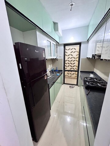 Kitchen in 2 BHK Apartment at Lodha Palava Downtown, Dombivli East – for Rent