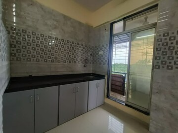 Kitchen in 1 BHK Apartment at Seawoods – for Sale