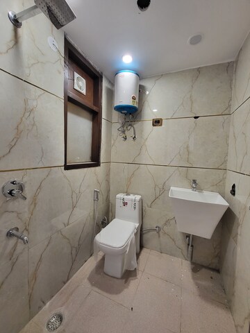 Bathroom in 2 BHK Apartment at Palm Residency Chhatarpur, Chattarpur – for Rent