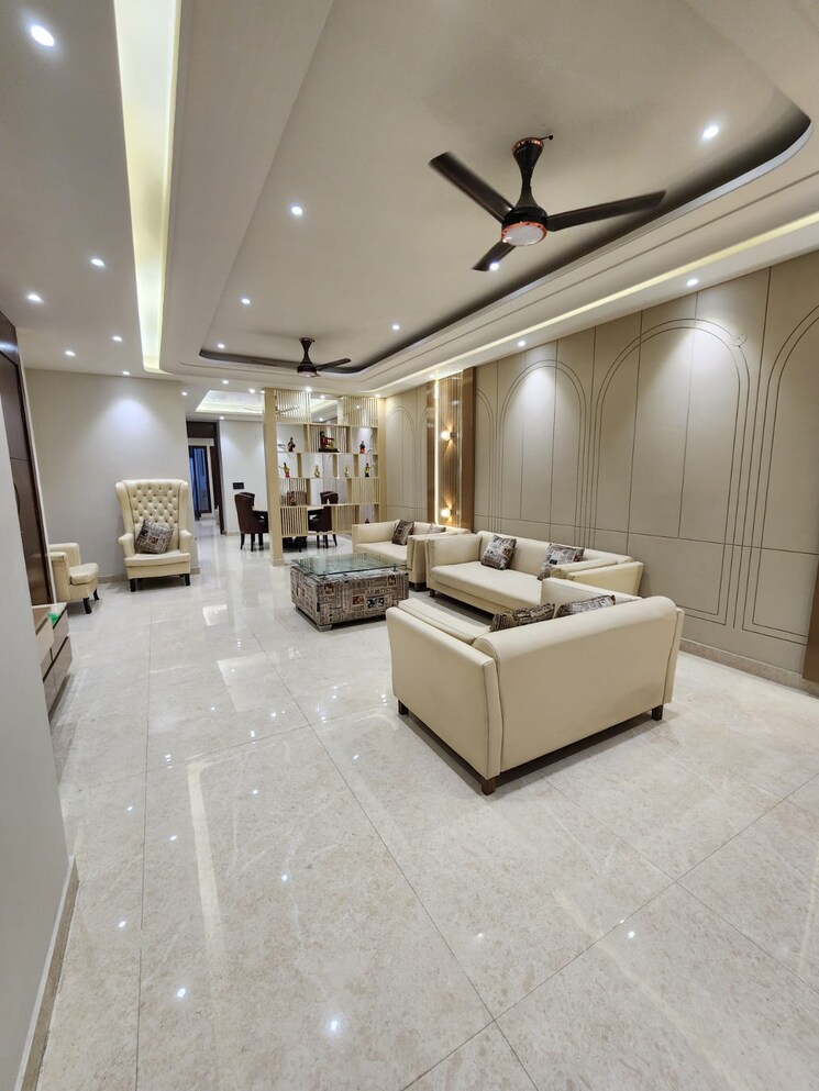 Living Room, niho-marvel-scottish-garden 3.5 Bedroom 1885 Sq.Ft. Penthouse In Ahinsa Khand ii Ghaziabad 8084441