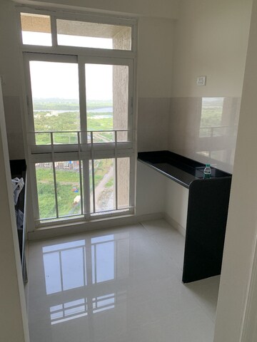 Kitchen in 1 BHK Apartment at Vijay Orovia, Ghodbunder Road – for Sale