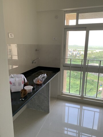 Kitchen in 1 BHK Apartment at Vijay Orovia, Ghodbunder Road – for Sale