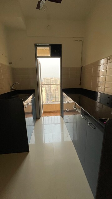 Kitchen in 2 BHK Apartment at JP North Imperia Tower 2, Mira Road – for Rent
