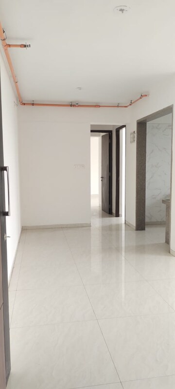 Building Lobby in 2 BHK Apartment at Mohankheda Gardens, Ambivali – for Sale