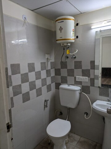 Bathroom in 2 BHK Apartment at Gaur Yamuna City 16th Park View, Gaur Yamuna City – for Rent