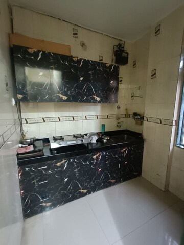 Kitchen in 1 BHK Apartment at Seawoods – for Sale