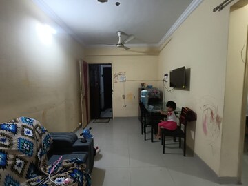 Living Room in 1 BHK Apartment at Seawoods – for Sale