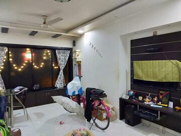 Living Room in 1 BHK Apartment at Homes Crom Park CHS, Lokmanya Nagar – for Sale