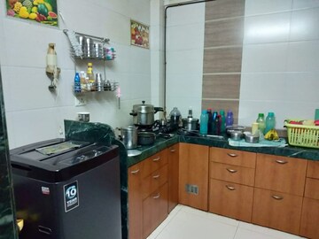 Kitchen in 1 BHK Apartment at Homes Crom Park CHS, Lokmanya Nagar – for Sale