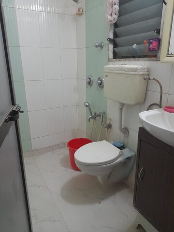 Bathroom in 1 BHK Apartment at Surya Upvan CHS, Gawand Baug – for Rent