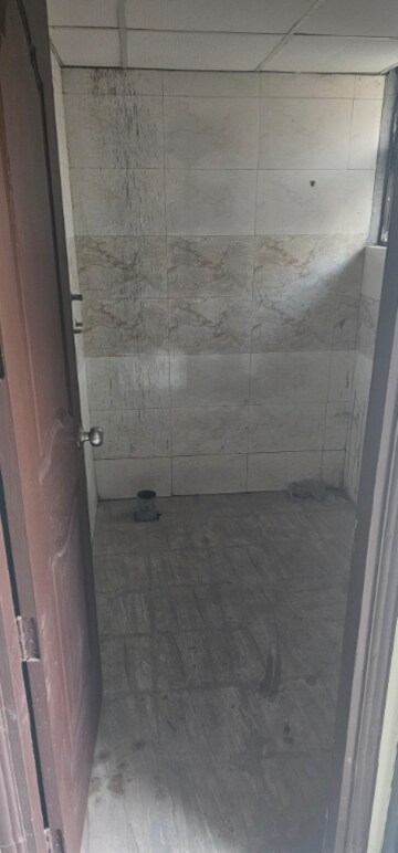 Bathroom in 3 BHK Apartment at Charms Castle, Raj Nagar Extension – for Sale