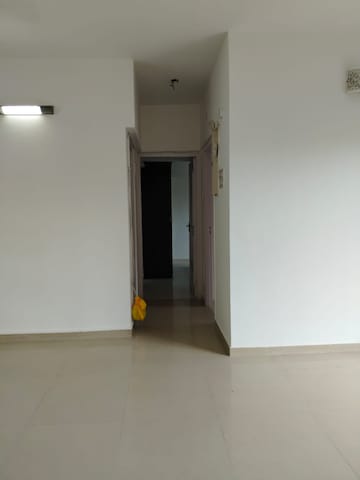 Room in 2.5 BHK Apartment at Raheja Serenity, Kandivali East – for Sale
