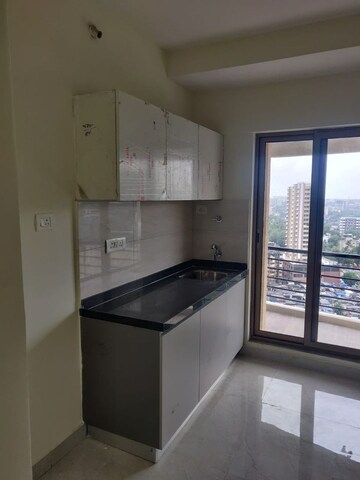 Kitchen in 2 BHK Apartment at MJ Shah Centrio, Govandi – for Rent