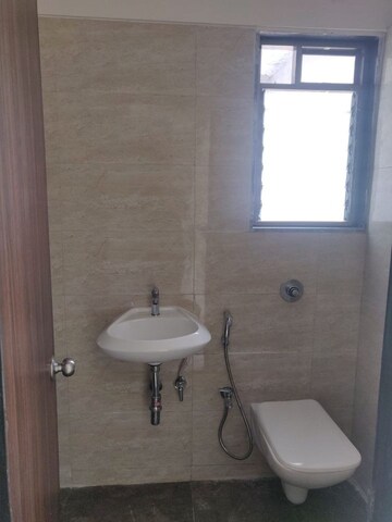 Bathroom in 2 BHK Apartment at MJ Shah Centrio, Govandi – for Rent