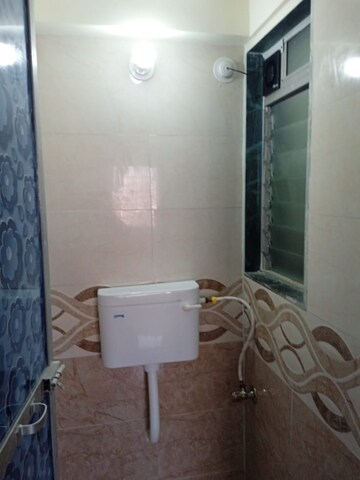 Bathroom in 2 BHK Apartment at Tilak Nagar Building, Tilak Nagar – for Rent