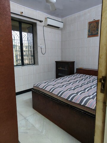 Master Bedroom in 2 BHK Apartment at Dheeraj Solitaire, Malad West – for Rent