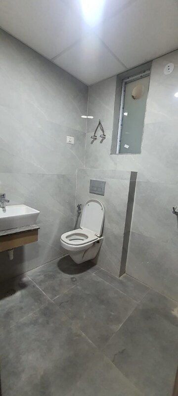 Bathroom in 2 BHK Apartment at JKG Palm Resort, Raj Nagar Extension – for Rent