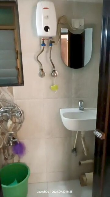 Bathroom in 2 BHK Apartment at Jai Sheetal Complex, Mira Road – for Sale