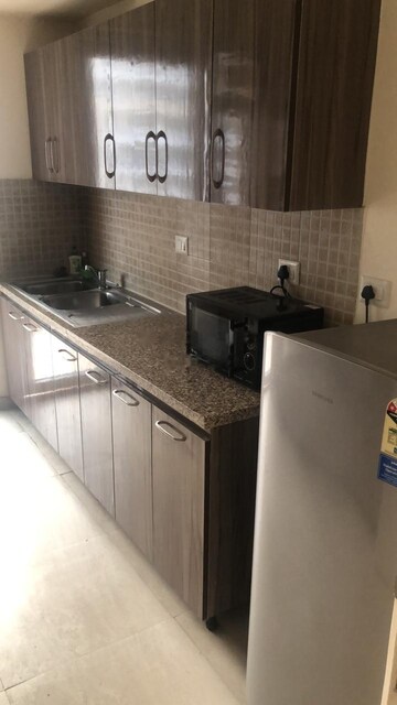 Kitchen in 3 BHK Apartment at DLF The Skycourt, Sector 86 – for Rent