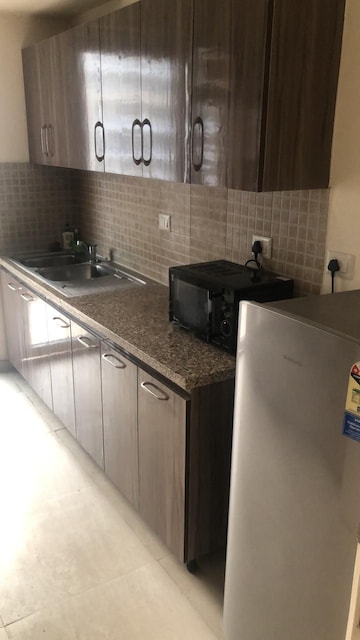 Kitchen in 3 BHK Apartment at DLF The Skycourt, Sector 86 – for Rent