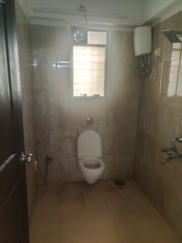 Bathroom in 2 BHK Apartment at Jinku CHS, Kandivali West – for Rent