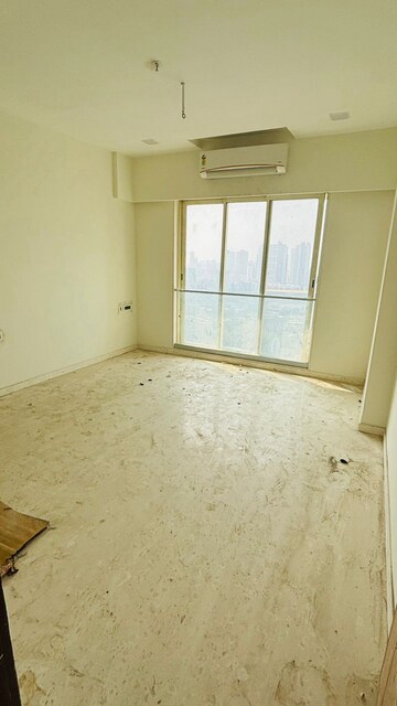 Bedroom in 2 BHK Apartment at Shapoorji Pallonji Epsilon, Kandivali East – for Rent