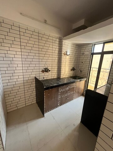 Kitchen in 1 RK Apartment at A V Crystal Tower, Vasai East – for Sale