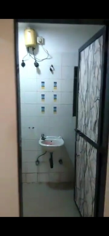 Bathroom in 1 BHK Apartment at Shepherd Residency, Goregaon West – for Rent