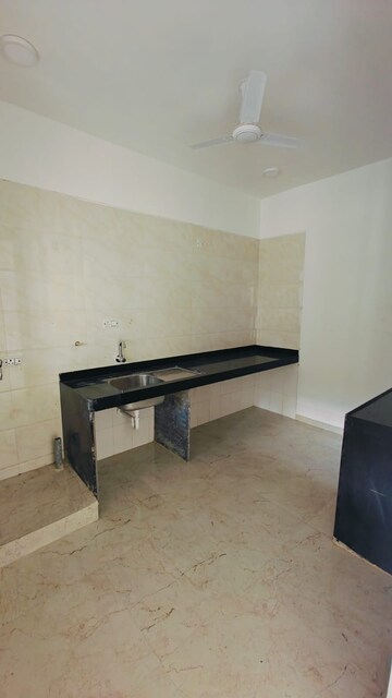 Kitchen in 2 BHK Apartment at Rama Metro Life, Tathawade – for Rent