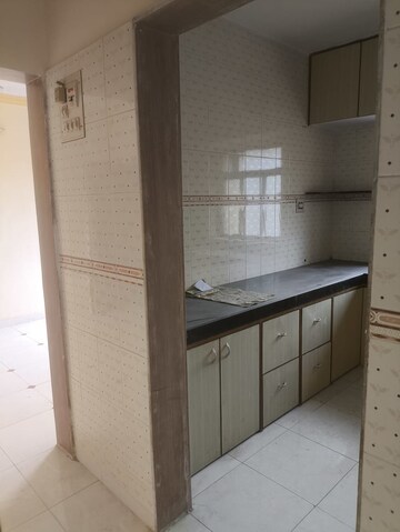 Kitchen in 2 BHK Apartment at Ambo Apartment, Virar West – for Sale