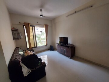 Living Room in 1 BHK Apartment at Raunak Delight, Owale – for Rent