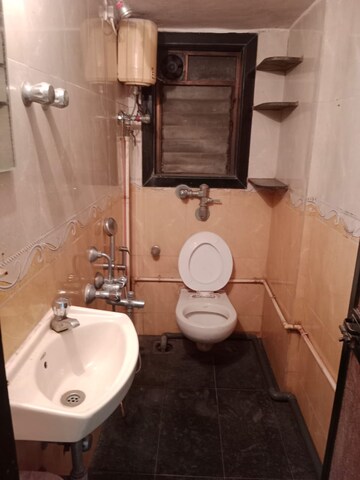 Bathroom in 2 BHK Apartment at MidCity Sudha, Khar West – for Rent