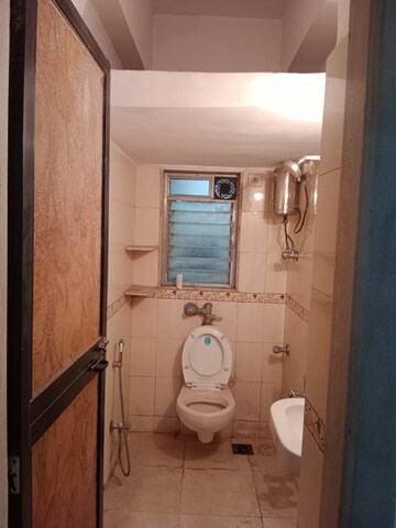 Bathroom in 2 BHK Apartment at MidCity Sudha, Khar West – for Rent
