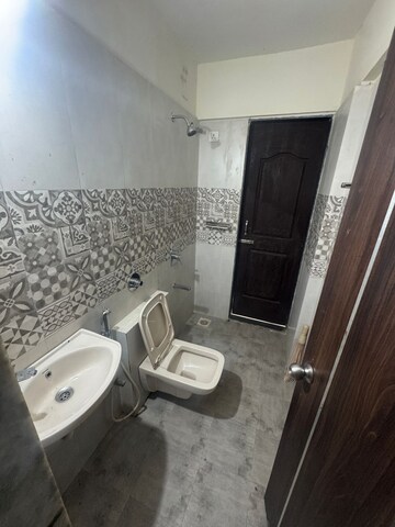 Bathroom in 1 BHK Apartment at Raunak Bliss, Ghodbunder Road – for Rent